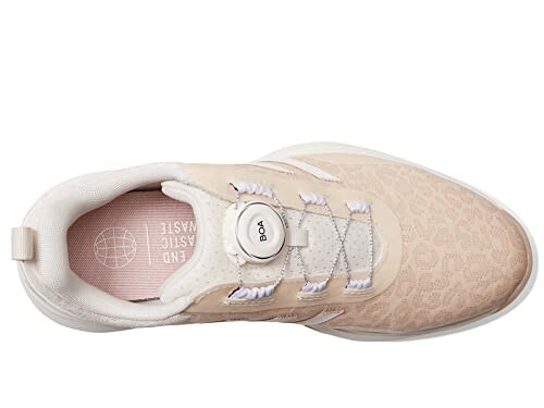 Top view of a beige sneaker with a BOA closure system.