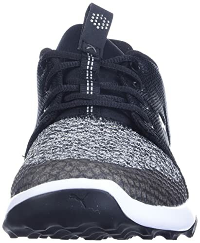 Front view of a black and white sneaker