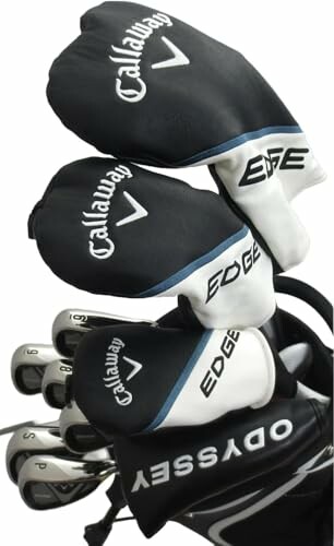 Set of Callaway Edge golf clubs with covers.