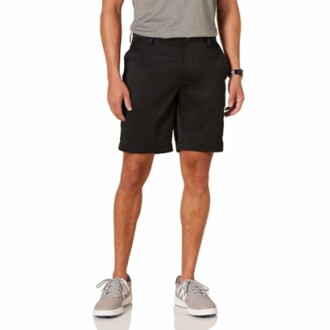 Man wearing black shorts and gray shirt