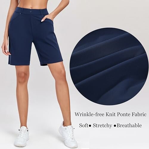 Woman wearing navy wrinkle-free knit ponte fabric Bermuda shorts.