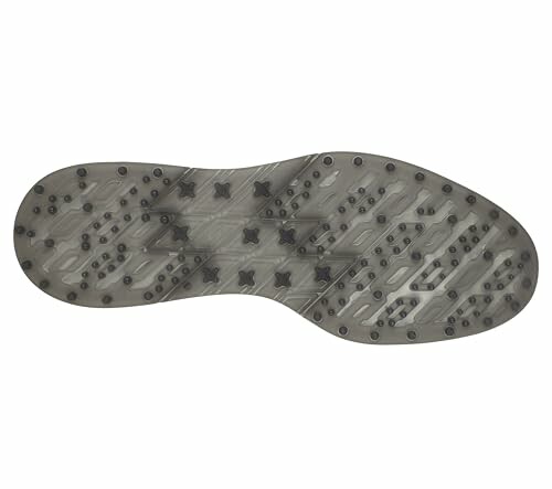 Bottom view of a shoe sole with a studded pattern